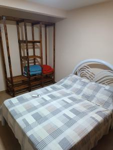 Uma cama ou camas num quarto em Cobertura em Aperibé