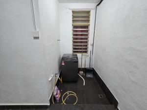 Ein Sitzbereich in der Unterkunft Radzz Homestay