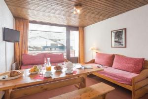 Posezení v ubytování Résidence partenaire Le Schuss + 34 fotografií