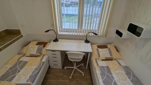 Postel nebo postele na pokoji v ubytování Apartmán Štěpánka
