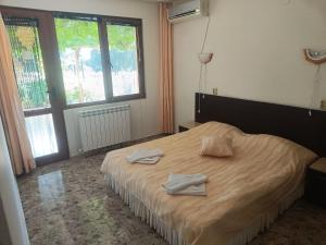 Postel nebo postele na pokoji v ubytování Sirius Guest House