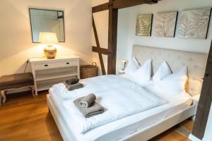 Postel nebo postele na pokoji v ubytování Hof Bockelkathen Apartment 2