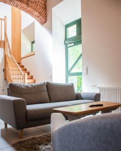 Posezení v ubytování B&B La Ferme de l'Hosté
