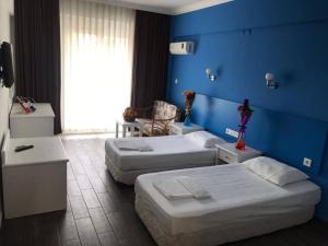 Postel nebo postele na pokoji v ubytování Hancı apart