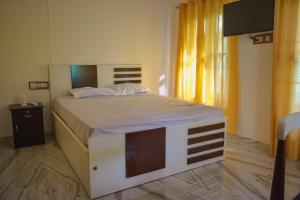 Vrindavan homestay客房内的一张或多张床位