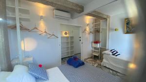Katil atau katil-katil dalam bilik di Apartamento centro de Dénia 1ra linea, vistas puerto y mar