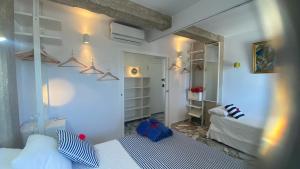 Katil atau katil-katil dalam bilik di Apartamento centro de Dénia 1ra linea, vistas puerto y mar