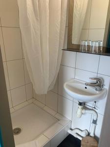 Koupelna v ubytování Hôtel Fine