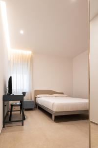 Postel nebo postele na pokoji v ubytování Lenuccia Home