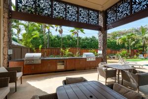 Sodas prie apgyvendinimo įstaigos Hanalei Colony Resort I-2