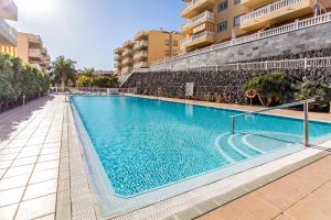 Bazén v ubytovaní Palm Duplex Penthouse alebo v jeho blízkosti