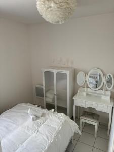 Ένα ή περισσότερα κρεβάτια σε δωμάτιο στο Magnifique appartement