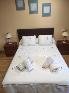 Cama o camas de una habitación en Casa Rural La Maestra