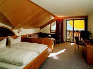 Postel nebo postele na pokoji v ubytování Hotel Schauinsland