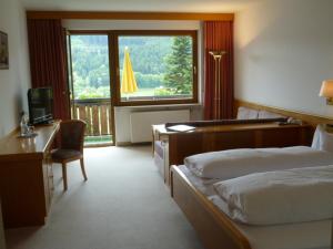 Postel nebo postele na pokoji v ubytování Hotel Schauinsland