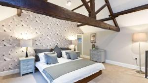 Katil atau katil-katil dalam bilik di Thornbridge Lodge