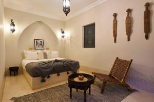 Postel nebo postele na pokoji v ubytování Riad Algora en exclusivité 13 P au cœur de la Médina