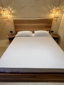 Postel nebo postele na pokoji v ubytování Casa Boha