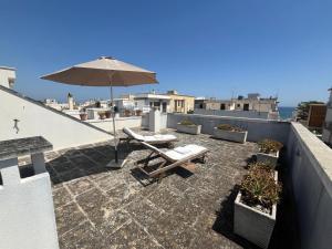 A balcony or terrace at Villa Bianca, Seaside panoramic Rooftop
