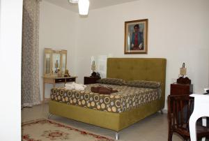 Ένα ή περισσότερα κρεβάτια σε δωμάτιο στο B&B a Casa Mia