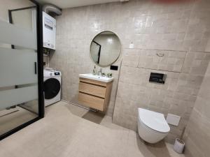 Koupelna v ubytování Nooruse Charm Apartment