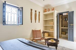 Postel nebo postele na pokoji v ubytování Riad Algora en exclusivité 13 P au cœur de la Médina