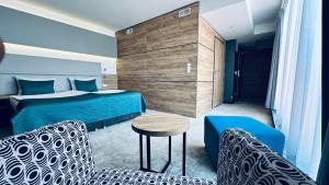 Postel nebo postele na pokoji v ubytování Hotel Limanova