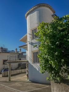 Μπαλκόνι ή βεράντα στο B&B "LE LUCI" CAMERA IN ATTICO SUPER VISTA interno 2 rose rosa