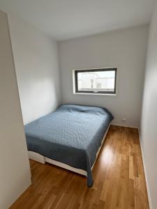 Ένα ή περισσότερα κρεβάτια σε δωμάτιο στο Modern 3-bedroom house with sea-view