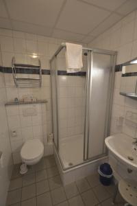 Koupelna v ubytování Hotel Nord