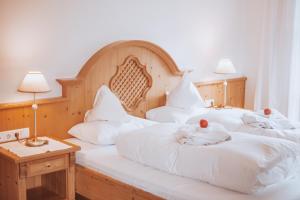 Postel nebo postele na pokoji v ubytování Hotel Schönblick