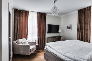 Ένα ή περισσότερα κρεβάτια σε δωμάτιο στο Söderfors Herrgård