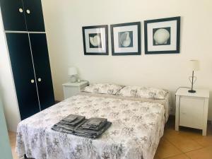 Postel nebo postele na pokoji v ubytování VelaLatina