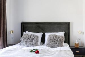 Ένα ή περισσότερα κρεβάτια σε δωμάτιο στο Söderfors Herrgård
