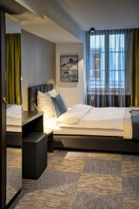 Ліжко або ліжка в номері Boutique Hotel Reiser