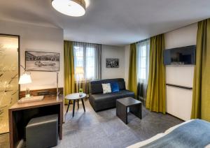 TV a/nebo společenská místnost v ubytování Boutique Hotel Reiser