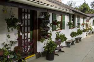 En have udenfor Pousada Florada na Serra - Apto 7