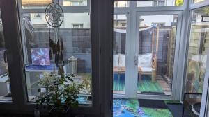 a sliding glass door with a view of a balcony at nur für dich in Kaufbeuren +2 photos