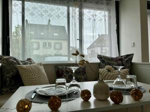 Posezení v ubytování Le charmant studio n 32B à 350m des plages