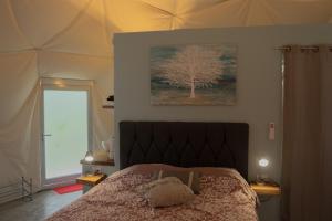 Postel nebo postele na pokoji v ubytování Pura Vista Glamping