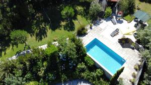 an overhead view of a swimming pool in a yard at Casa da lapa in Paredes de Coura