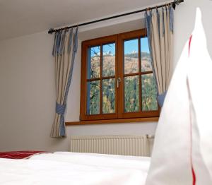 Posteľ alebo postele v izbe v ubytovaní Alpenferienwohnung Strickner