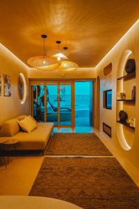 Posezení v ubytování Q Coconuts Seaside Suites