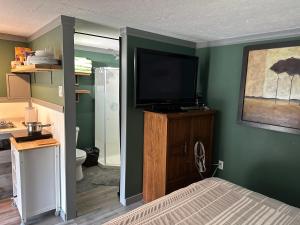 Kuchyň nebo kuchyňský kout v ubytování Cozy cabin