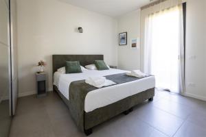 Postel nebo postele na pokoji v ubytování IseoLakeRental - Villa ParadISEO