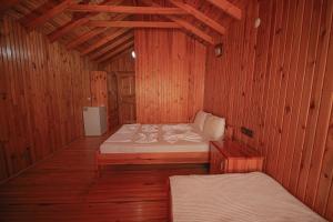 Postel nebo postele na pokoji v ubytování YAVUZ MOTEL ADRASAN