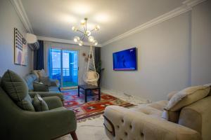 A television and/or entertainment centre at Skyline Premium Properties