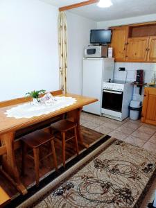Kuchyň nebo kuchyňský kout v ubytování Guest Rooms Dona