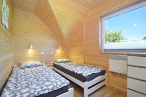 Кровать или кровати в номере Westbeach House