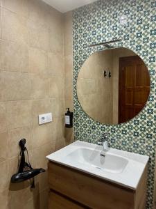 Ένα μπάνιο στο Bonito y acogedor apartamento en Tíjola